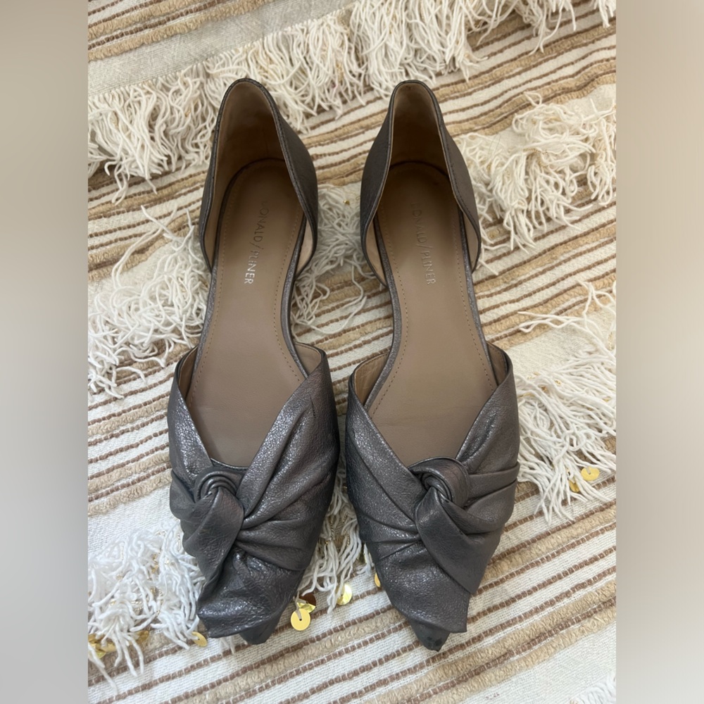 Donald j pliner. Dorsey loafers in silver. Very good condition.